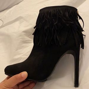 Black ankle boot with tassels